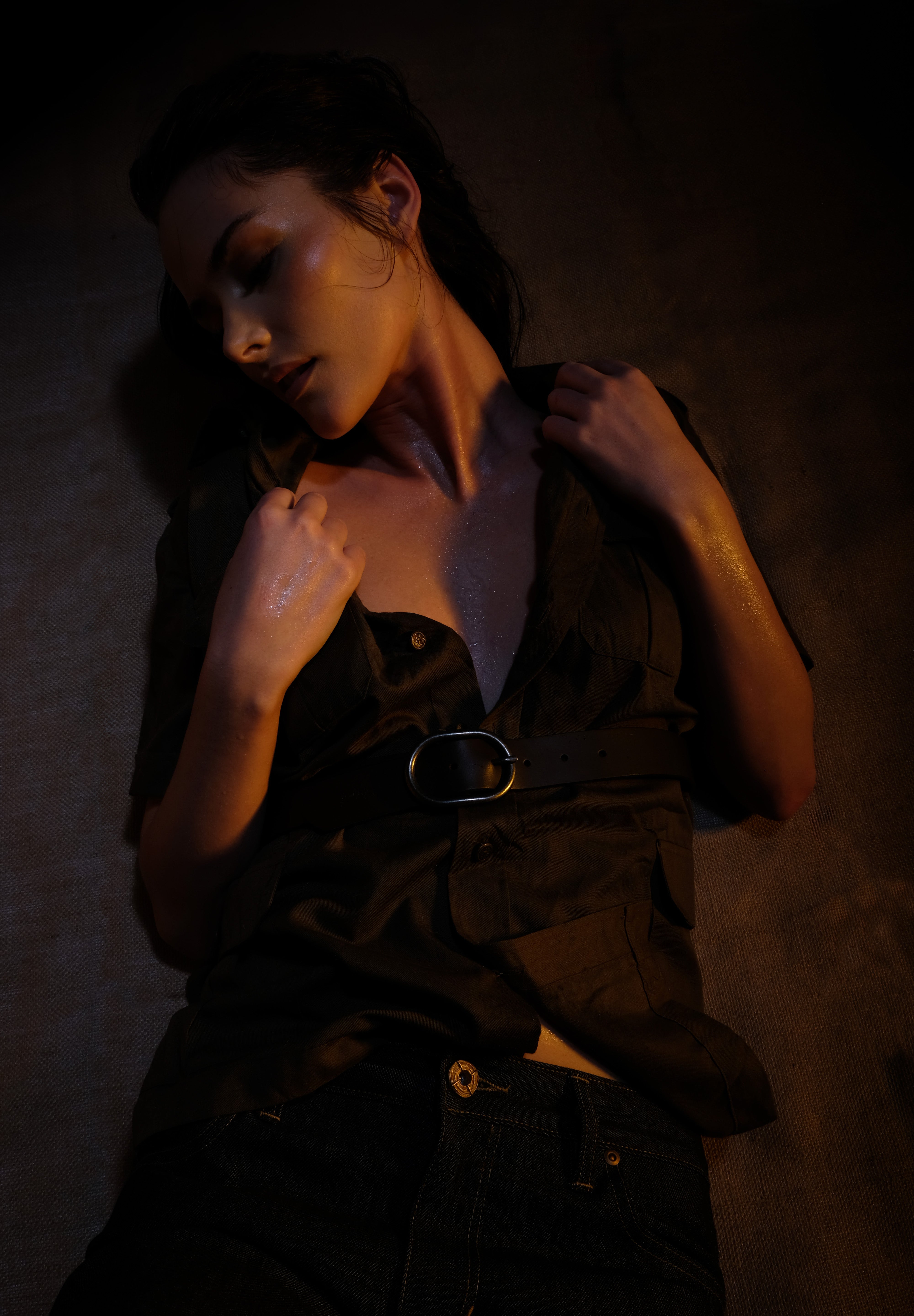 hot safari spring summer woman in raw jeans and leather belt safari shirt